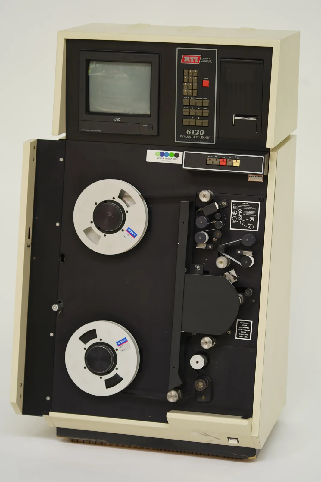 TapeChek 6120CL 1-inch broadcast cleaner — overhead view with reels